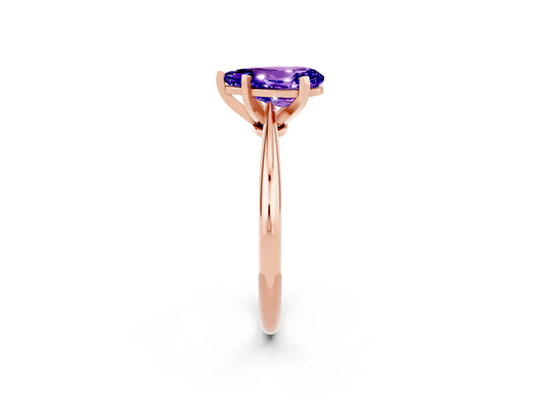 Rose gold Pear Cut Tanzanite Solitaire Engagement Ring with Classic Band and Four-Prong Setting