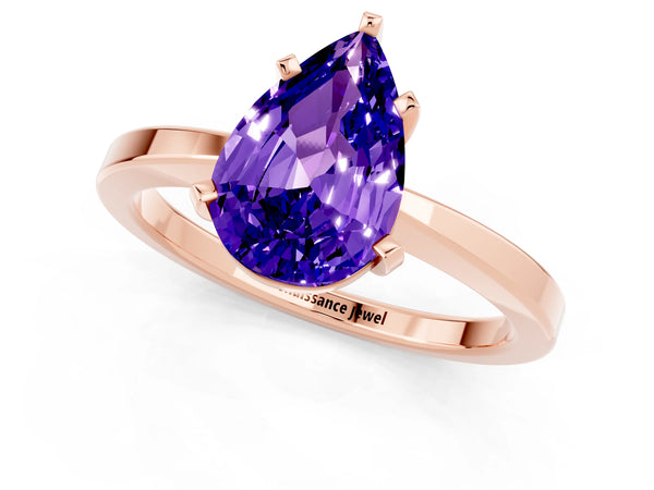 Rose gold Pear Cut Tanzanite Solitaire Engagement Ring with Classic Band and Four-Prong Setting