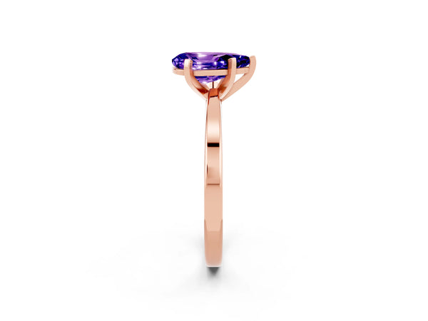 Rose gold Pear Cut Tanzanite Solitaire Engagement Ring with Classic Band and Four-Prong Setting