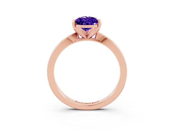 Rose gold Pear Cut Tanzanite Solitaire Engagement Ring with Classic Band and Four-Prong Setting