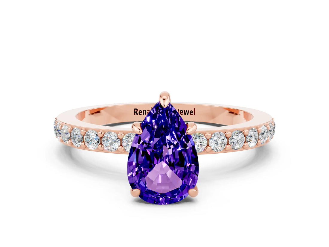 Rose gold Pear Cut Tanzanite Solitaire Engagement Ring with Pavé Band and Four-Prong Setting