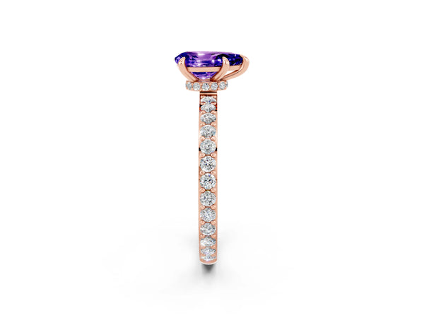 Rose gold Pear Cut Tanzanite Solitaire Engagement Ring with Pavé Band and Four-Prong Setting