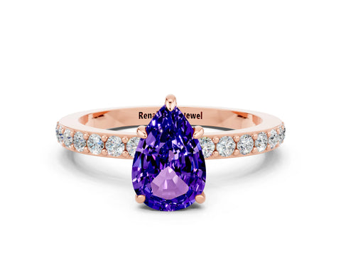 Rose gold Pear Cut Tanzanite Solitaire Engagement Ring with Pavé Band and Four-Prong Setting