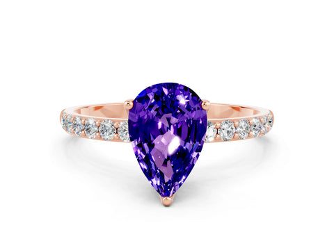 Rose gold Pear Cut Tanzanite Solitaire Engagement Ring with Pavé Band and Prong Setting