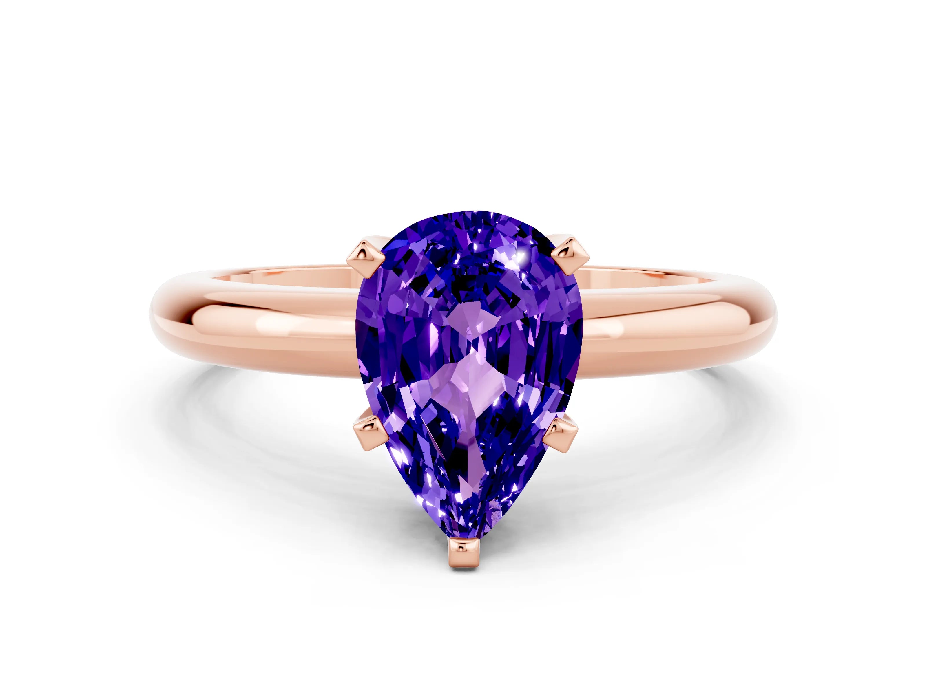 Rose gold Pear Cut Tanzanite Solitaire Engagement Ring with Round Band and Four-Prong Setting