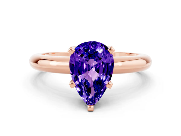 Rose gold Pear Cut Tanzanite Solitaire Engagement Ring with Round Band and Four-Prong Setting