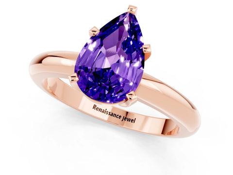Rose gold Pear Cut Tanzanite Solitaire Engagement Ring with Round Band and Four-Prong Setting_1