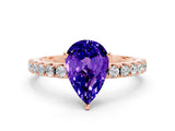 Rose gold Pear Cut Tanzanite Solitaire Pavé Band with Four-Prong Setting