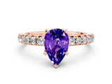 Rose gold Pear Cut Tanzanite Solitaire Pavé Engagement Ring with Round Band and Prong Setting_12