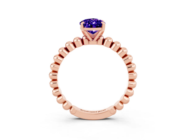 Rose gold Pear Cut Tanzanite Solitaire Ring with Beaded Band and Prong Setting