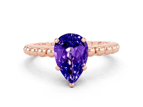 Rose gold Pear Cut Tanzanite Solitaire Ring with Beaded Band and Prong Setting