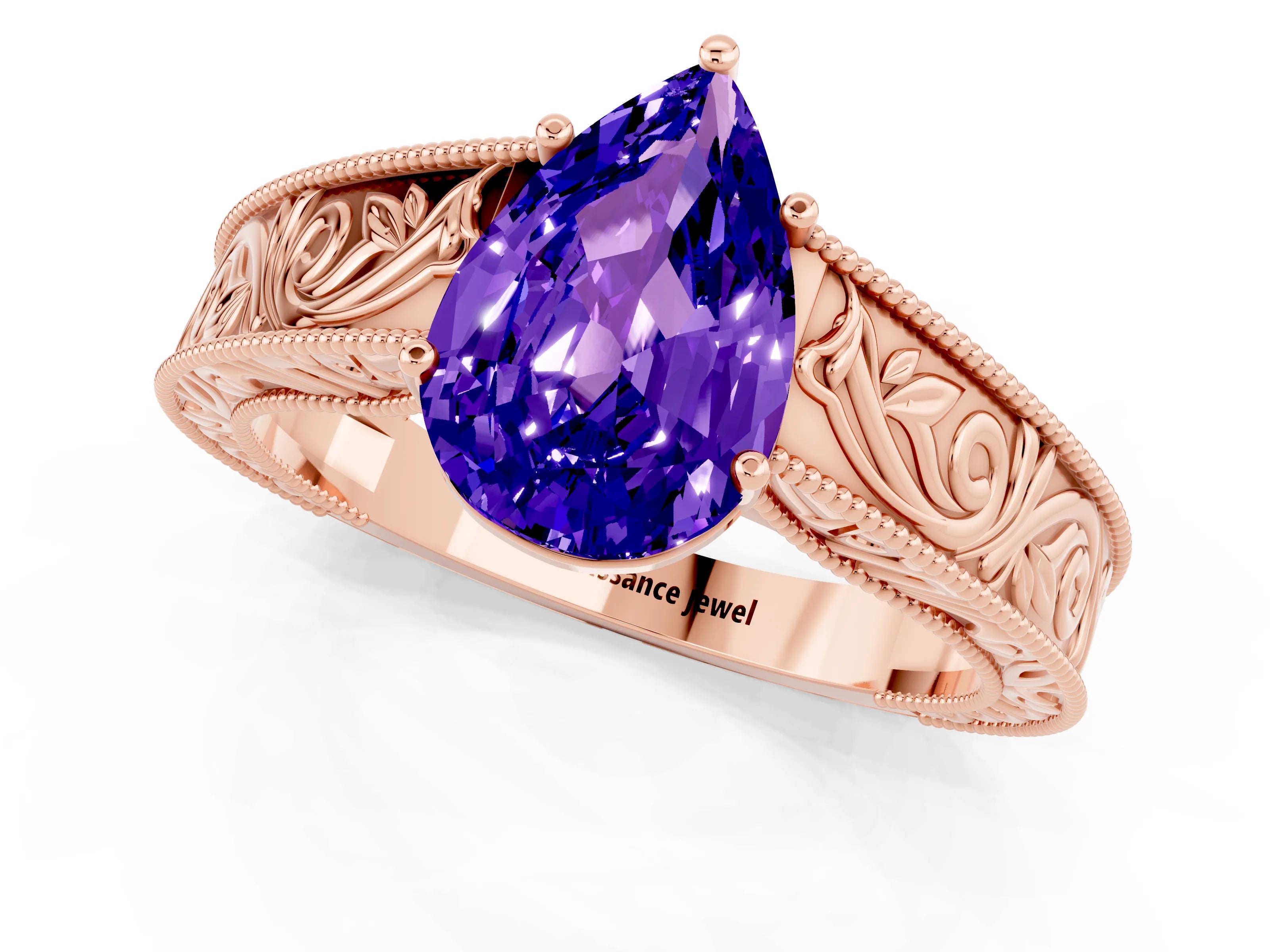 Rose gold Pear Cut Tanzanite Solitaire Ring with Engraved Band and Four-Prong Setting_1