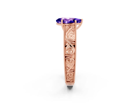 Rose gold Pear Cut Tanzanite Solitaire Ring with Engraved Band and Four-Prong Setting_2