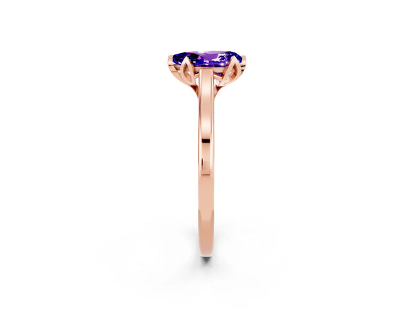 Rose gold Pear Cut Tanzanite Solitaire Ring with Flower Prong Setting and Classic Band