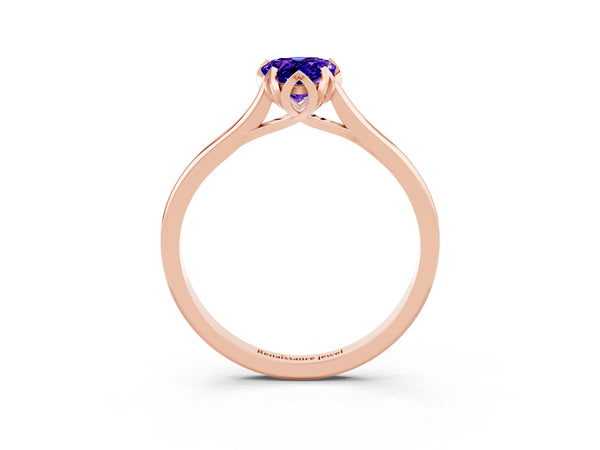 Rose gold Pear Cut Tanzanite Solitaire Ring with Flower Prong Setting and Classic Band