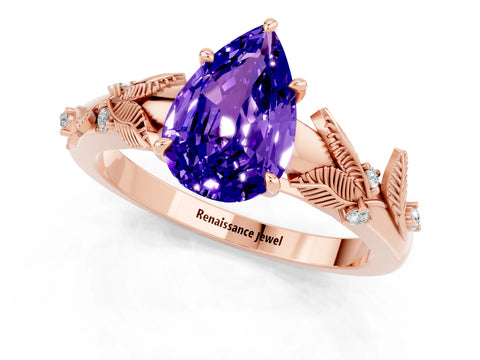 Rose gold Pear Cut Tanzanite Solitaire Ring with Leaf Motif Band and Four-Prong Setting_1
