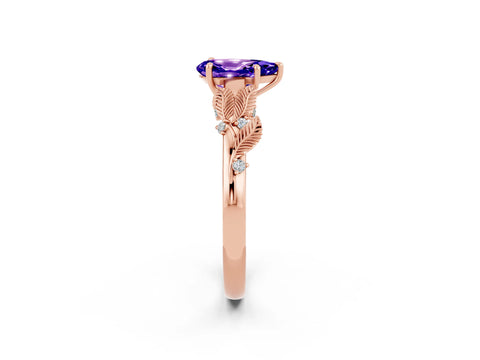 Rose gold Pear Cut Tanzanite Solitaire Ring with Leaf Motif Band and Four-Prong Setting_2