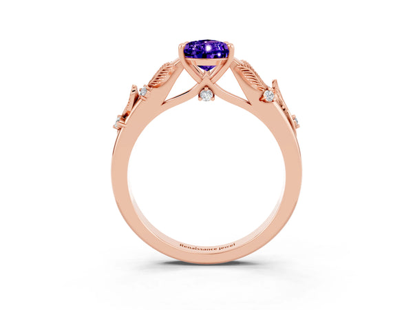 Rose gold Pear Cut Tanzanite Solitaire Ring with Leaf Motif Band and Four-Prong Setting