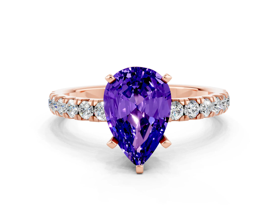 Rose gold Pear Cut Tanzanite Solitaire Ring with Pavé Accents and Four-Prong Setting