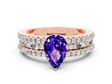 Rose gold Pear Cut Tanzanite Solitaire Ring with Pavé and Channel Set Band