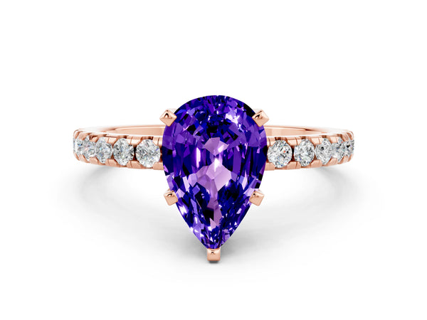 Rose gold Pear Cut Tanzanite Solitaire Ring with Round Pavé Band and Four-Prong Setting