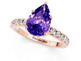 Rose gold Pear Cut Tanzanite Solitaire Ring with Round  Pavé Band and Four-Prong Setting_45