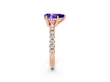 Rose gold Pear Cut Tanzanite Solitaire Ring with Round  Pavé Band and Four-Prong Setting_46