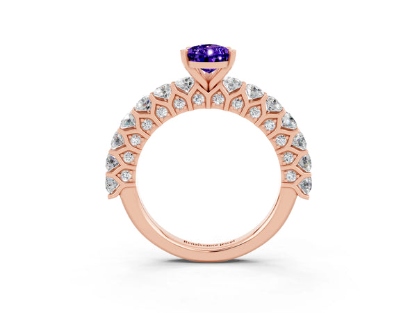 Rose gold Pear Cut Tanzanite Solitaire Ring with Shared Prong Pavé Band and Four-Prong Setting