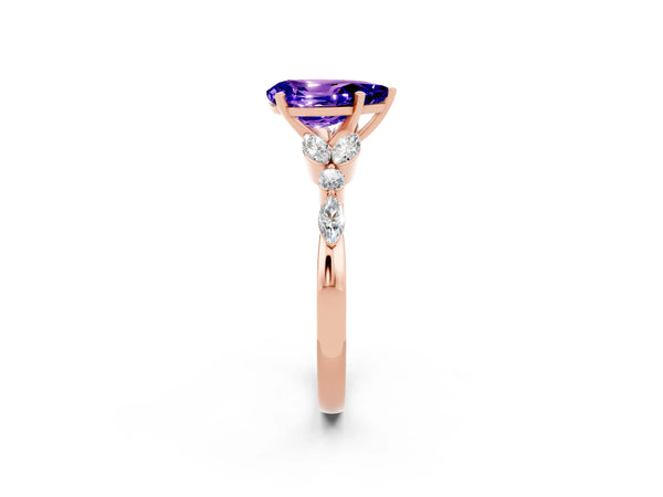 Rose gold Pear Cut Tanzanite Solitaire Ring with Side Stones and Four-Prong Setting