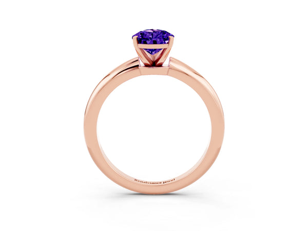 Rose gold Pear Cut Tanzanite Solitaire Ring with Six-Prong Setting and Classic Band