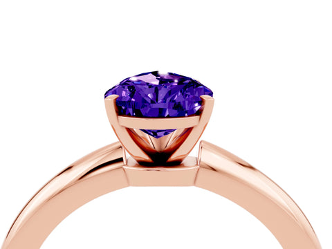 Rose gold Pear Cut Tanzanite Solitaire Ring with Six-Prong Setting and Classic Band_4