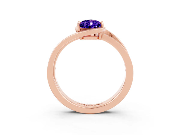 Rose gold Pear Cut Tanzanite Solitaire Ring with Split Shank and Prong Setting