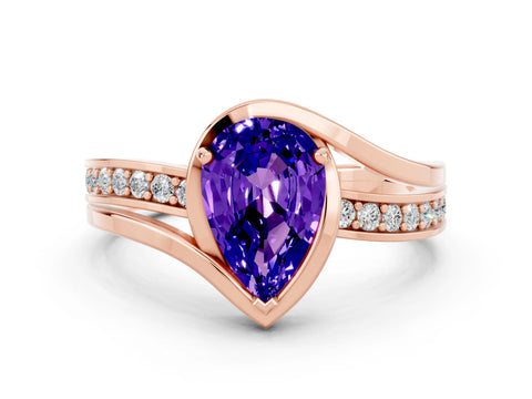 Rose gold Pear Cut Tanzanite Solitaire Ring with Split Shank and Prong Setting