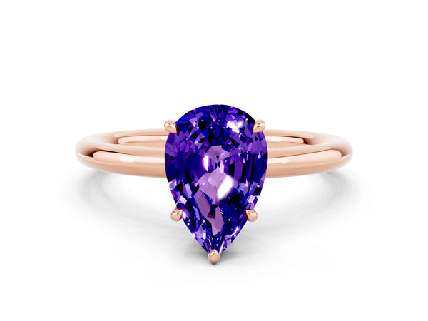 Rose gold Pear Cut Tanzanite Solitaire Ring with Thin Band and Four-Prong Setting
