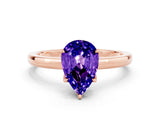 Rose gold Pear Cut Tanzanite Solitaire Ring with Thin Band and Prong Setting_12