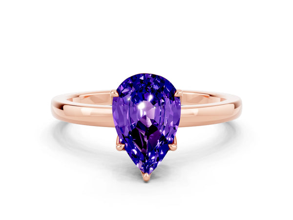 Rose gold Pear Cut Tanzanite Solitaire Ring with Thin Band and Prong Setting