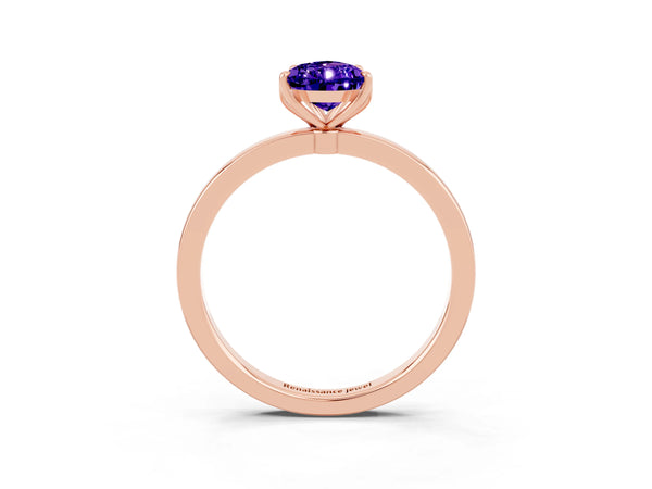 Rose gold Pear Cut Tanzanite Solitaire Ring with Thin Band and Prong Setting