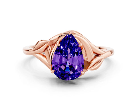 Rose gold Pear Cut Tanzanite Solitaire Ring with Twist Band and Four-Prong Setting_24
