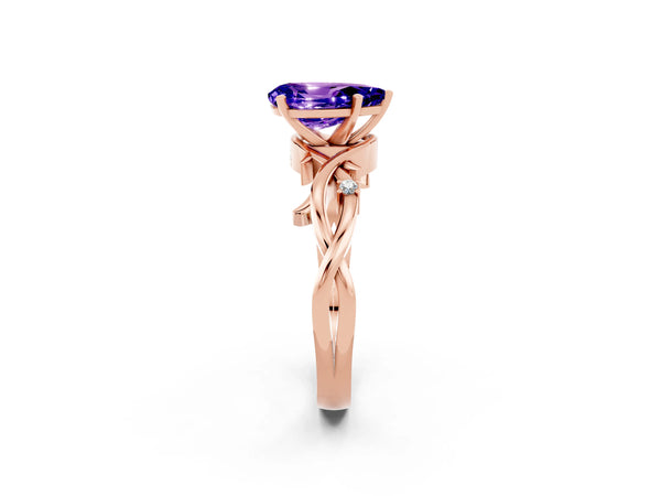 Rose gold Pear Cut Tanzanite Solitaire Ring with Twisted Band and Prong Setting