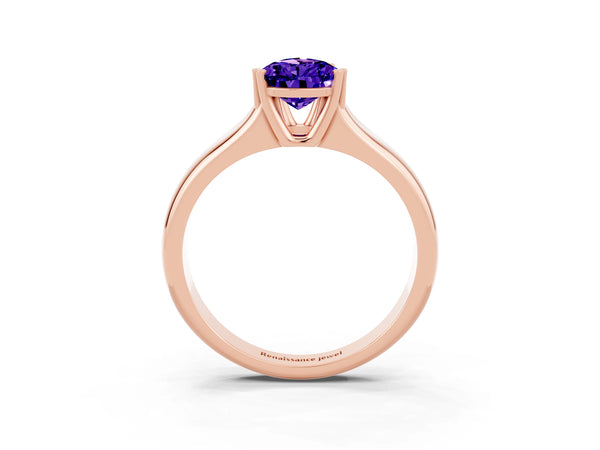 Rose gold Pear Cut Tanzanite Solitaire Ring with Wide Band and Prong Setting