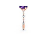 Rose gold Pear Cut Tanzanite Solitaire with Side Stones on a Pavé Band and Four-Prong Setting_2