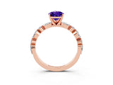 Rose gold Pear Cut Tanzanite Solitaire with Side Stones on a Pavé Band and Four-Prong Setting_3