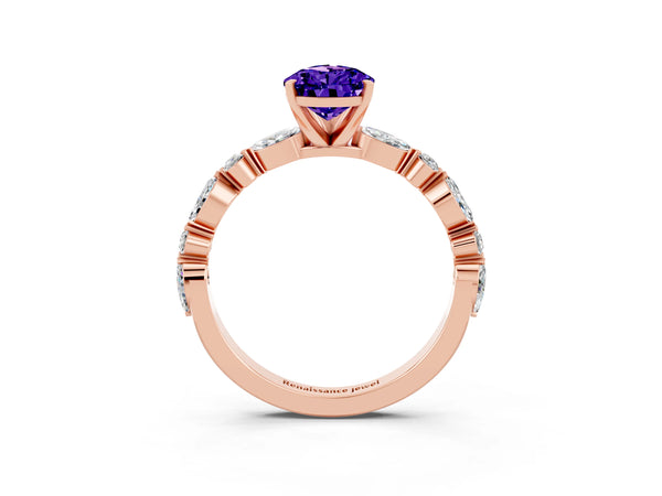Rose gold Pear Cut Tanzanite Ring with Marquise and Round  Side Stones and Four-Prong Setting
