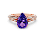 Rose gold Pear Cut Tanzanite Split Shank Engagement Ring with Pavé Band