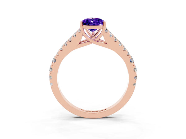 Rose gold Pear Cut Tanzanite Split Shank Pavé Engagement Ring with Four-Prong Setting