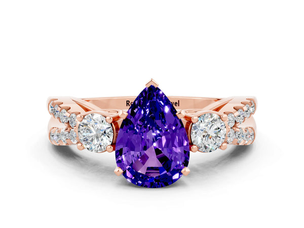 Rose gold Pear Cut Tanzanite Three-Stone Ring with Pavé Split Shank and Four-Prong Setting