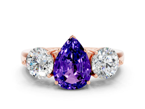 Rose gold Pear Cut Tanzanite Three-Stone Ring with Prong Setting and Classic Band
