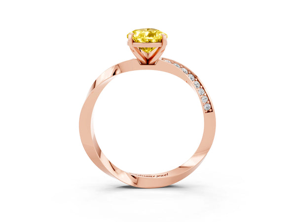 Rose gold Pear Cut Yellow Sapphire Engagement Ring with Side Stone Accents and Four-Prong Setting