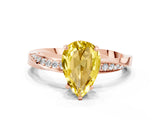 Rose gold Pear Cut Yellow Sapphire Engagement Ring with Side Stone Accents and Four-Prong Setting_60