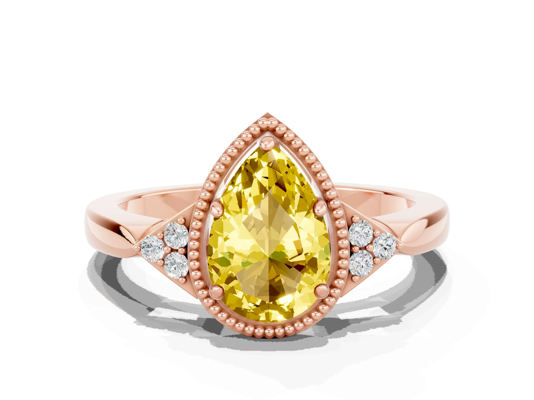 Rose gold Pear Cut Yellow Sapphire Halo Ring with Tapered Band and Four-Prong Setting